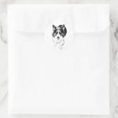 A blurred corgi captured in stride becomes a compa ronde sticker (Tas)