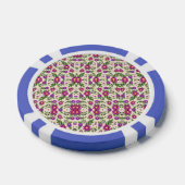 A casino chip features intricate floral patterns (Enkel)