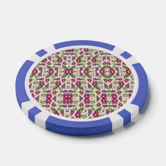 A casino chip features intricate floral patterns (Enkel)