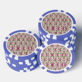 A casino chip features intricate floral patterns (Opstapeling)
