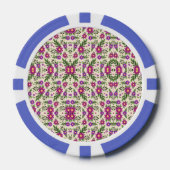 A casino chip features intricate floral patterns (Voorkant)