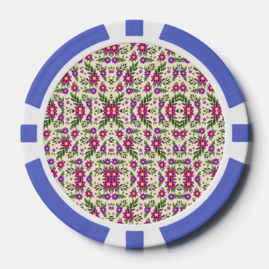 A casino chip features intricate floral patterns (Voorkant)