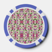 A casino chip features intricate floral patterns (Achterkant)
