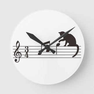 A Cat Toying with Notes Ronde Klok