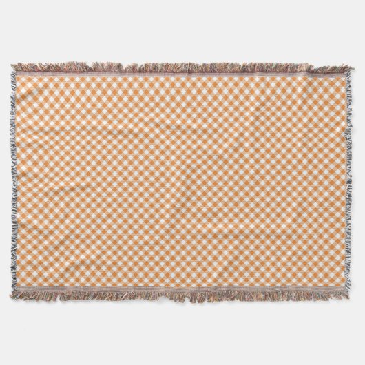 A checkered pattern throw blanket with orange  deken (Voorkant)