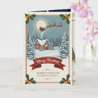 A Christmas card with snowy scenes, festive text, Kaart