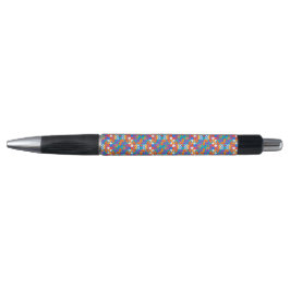A colorful pen with a black tip and clicker