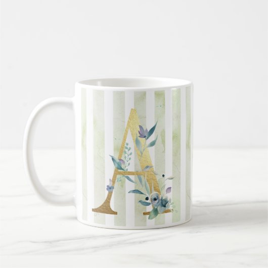 A, gouden initiaal op blauwe en witte strepen koffiemok (Links)