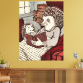 A hedgehog in a blanket reading a book to a young canvas afdruk (Insitu (Woonkamer))