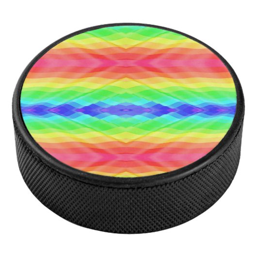 A hockey puck with a vibrant, symmetrical rainbow (3/4)