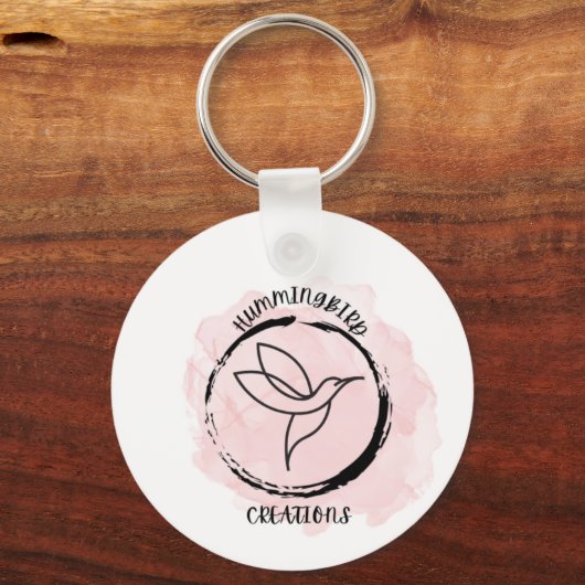 A hummingbird design for a logo on a keychain (Voorkant)