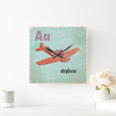 A is voor het vliegtuig vierkante klok (Huis)