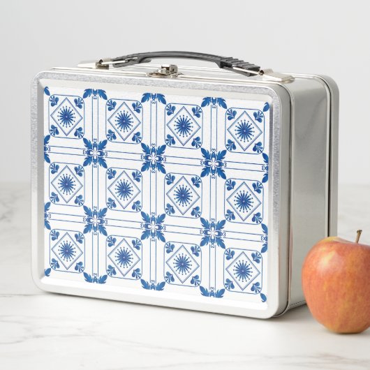 A metal lunchbox featuring a blue and white (In situ)