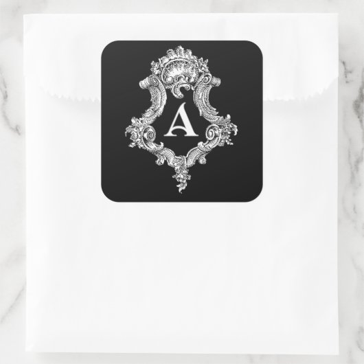 A Monogram Initiaal sticker (Tas)
