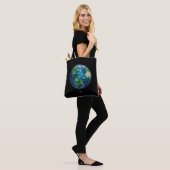 A painting of the earth in a space tote bag (Op model)