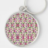 A round keychain features a detailed floral  (Voorkant)