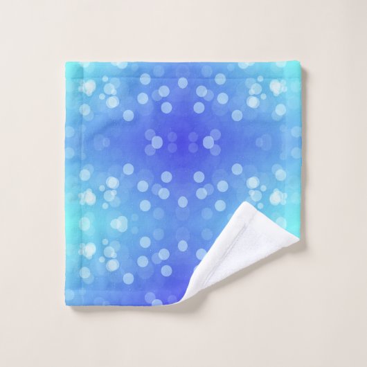 A set of vibrant blue and turquoise towels  bad handdoek (Wasdoekje)