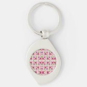 A silver teardrop keychain with a round pink (Voorkant)