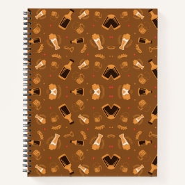 A spiral notebook with a brown cover notitieboek