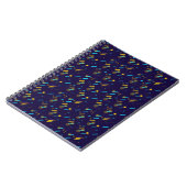 A spiral notebook with a dark blue cover  notitieboek (Linkerzijde)