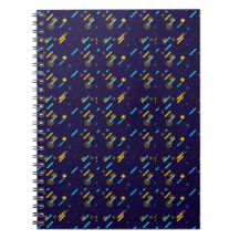 A spiral notebook with a dark blue cover