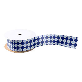 A spool of ribbon with a blue & white diamond  satijnen lint