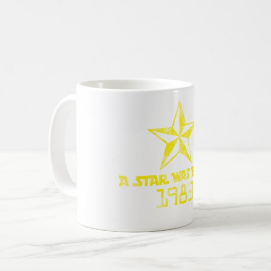  A Star werd in 1983 geboren als Yellow Star Koffiemok (Voorkant links)