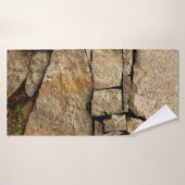 A stone wall made of cobblestones background textu badhanddoek (Badhanddoek)