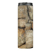 A stone wall made of cobblestones background textu thermosbeker (Achterkant)