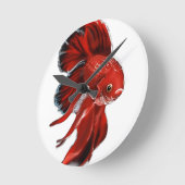 A vibrant red betta fish swimming. ronde klok (Hoek)