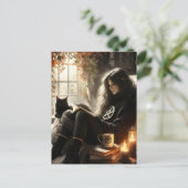 A witch reads with her black cat in a cozy chair briefkaart (Staand voorkant)