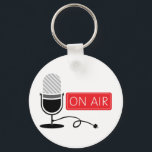 Aan de lucht sleutelhanger<br><div class="desc">Spreek luid en duidelijk in de microfoon en laat de wereld je horen! Dit ontwerp zal een geweldige toevoeging aan een t-shirt of een pet voor uw favoriete dj maken!</div>