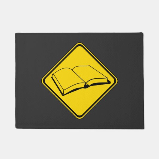 Aandachtboeken voorop deurmat (Voorkant)