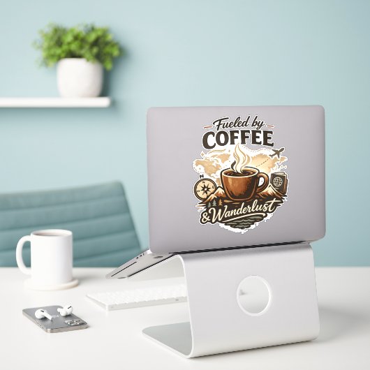 Aangedreven door koffie en zwerflust sticker (Laptop op bureau)