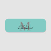 Aangepast initiaal en naamtekst blauwgroen naamplaatje (Voorkant)