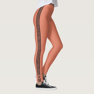 Aangepast logo drie zwarte strepen oranje  leggings