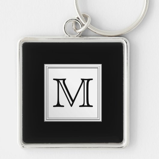 Aangepast monogram gedrukt. Zwart en Bleek grijs. Sleutelhanger (Voorkant)