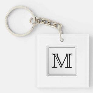 Aangepast monogram gedrukt. Zwart-wit. Sleutelhanger