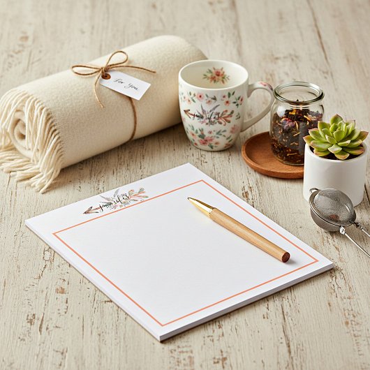 Aangepast notitieblok met de florale pijl