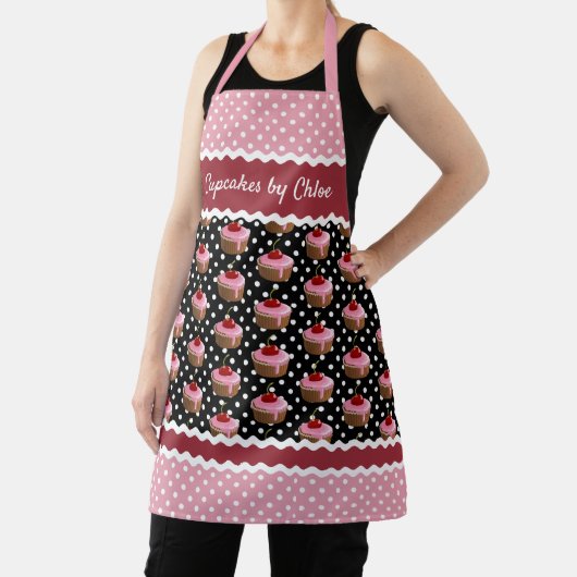 Aangepast roze cupcakes pokadots patroon op zwart schort (Insitu)