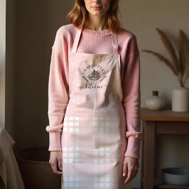 Aangepast roze keukengerei en broodbakken schort