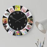 Aangepaste 12 zwarte fotocollage-ronde grote klok<br><div class="desc">De persoonlijke fotoklok met uw eigen douanefoto's. Het fotomalplaatje is opstelling klaar voor u om 12 van uw favoriete afbeeldingen toe te voegen die met de klok mee van de bovenkant werken. Dit slimme zwarte ontwerp heeft witte getallen en zal er geweldig uitzien met modern en hedendaags decor. Voor dit...</div>