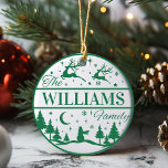 Aangepaste familienaam Classic Christmas Keepsake Keramisch Ornament<br><div class="desc">Voeg dit jaar een leuke en feestelijke touch toe aan uw kerstboom met een gepersonaliseerd ornament dat generaties lang kan worden doorgegeven. Dit klassieke groen-witte ontwerp is voorzien van rendieren die boven een met dennen gevuld sneeuwlandschap vliegen met een eenzame sneeuwpop staande wacht. Personaliseer door uw achternaam toe te voegen....</div>