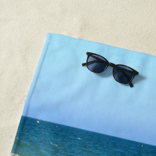 Aangepaste foto strandlaken met tekst gepersonalis (In situ)