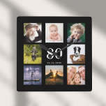 Aangepaste fotocollage voor 80e verjaardag zwart vierkante klok<br><div class="desc">Een wandklok als geschenk voor een 80ste verjaardag voor een man,  die zijn leven viert met een collage van 8 van je eigen foto's.  Pas leeftijd 80 aan en voeg een datum toe.  Geboortedatum of -datum. Witte gekleurde letters. Zwarte achtergrond.</div>
