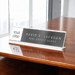 Aangepaste Logo Executive Black Professional Bureau Naambordje<br><div class="desc">Aangepast voeg uw eigen Company Logo Luxury Executive Black Folie Metallic Stainless Steel Minimalist Business Name Bord met wit geletterde typografie voor de monogram toe voeg uw eigen naam en functie of positie toe. Het Metal Business Professional Name Bord kan worden aangepast met jouw naam. Neem contact op met de...</div>
