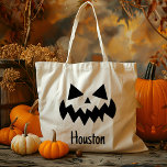Aangepaste Naam Jack O Lantern Pompoen Trick or tr Tote Bag<br><div class="desc">Vier Halloween in stijl met onze aangepaste naam Jack O' Lantern Pumpkin Trick or treat Canvas tas! Dit charmante tas is voorzien van een klassieke jack o’ lantaarn ontwerp met een vriendelijke pompoen gezicht, ideaal voor het toevoegen van een feestelijke touch aan de trick-or-treat avonturen van uw kind. met de...</div>