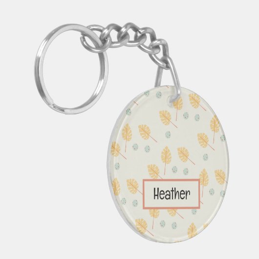 Aangepaste naam oranje tropische bladeren crème sleutelhanger (Voorkant Links)