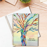 Aangepaste naam regenboog gekleurde boom planner<br><div class="desc">Deze bijzondere Planner is versierd met een regenboogkleurige boom en een waterverf achtergrond. Het originele ontwerp werd gemaakt in mozaïek met behulp van kleine stukjes helder gekleurd glas. Pas het aan met jouw naam en jaar. Gebruik de optie Ontwerpgereedschap om de tekstgrootte, -stijl of -kleur te wijzigen. Omdat we ons...</div>