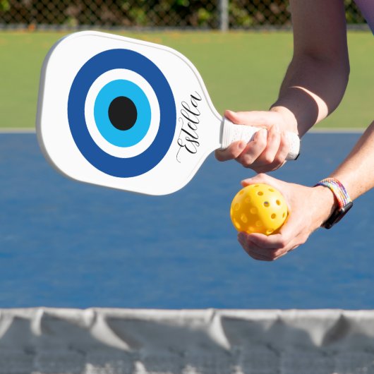Aangepaste pickleball racket met Evil Eye logo (Insitu)